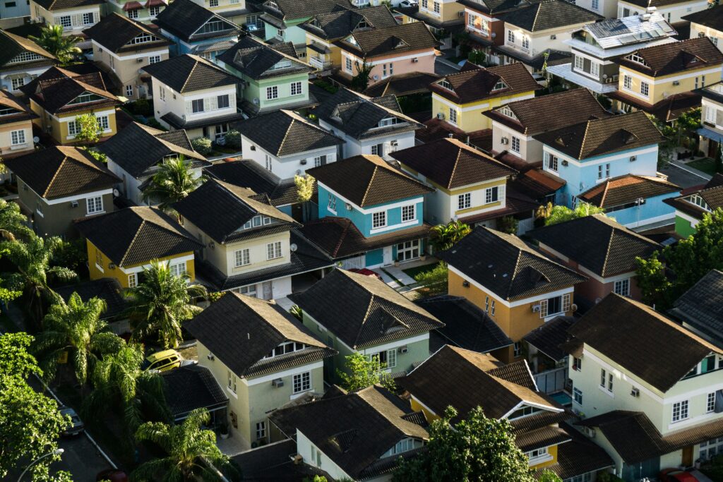 Aerial view of a dense residential neighborhood with many homes, representing a market of potential investment properties for DSCR loans.