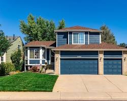 A modern family home in Centennial Colorado representing 30-year mortgages and CHFA assistance for first-time buyers.